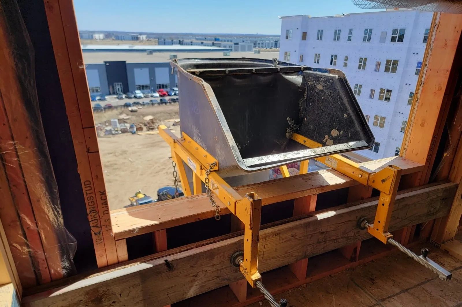 Custom scaffold platform with debris chute attachment