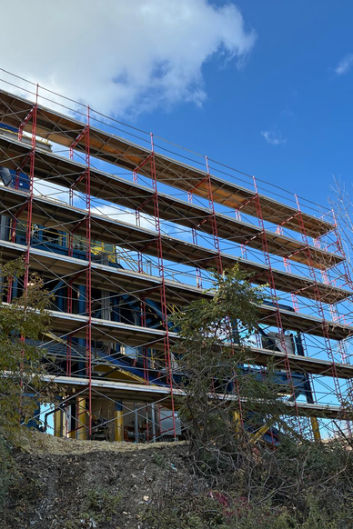 Frame scaffold supporting exterior painting and finishing