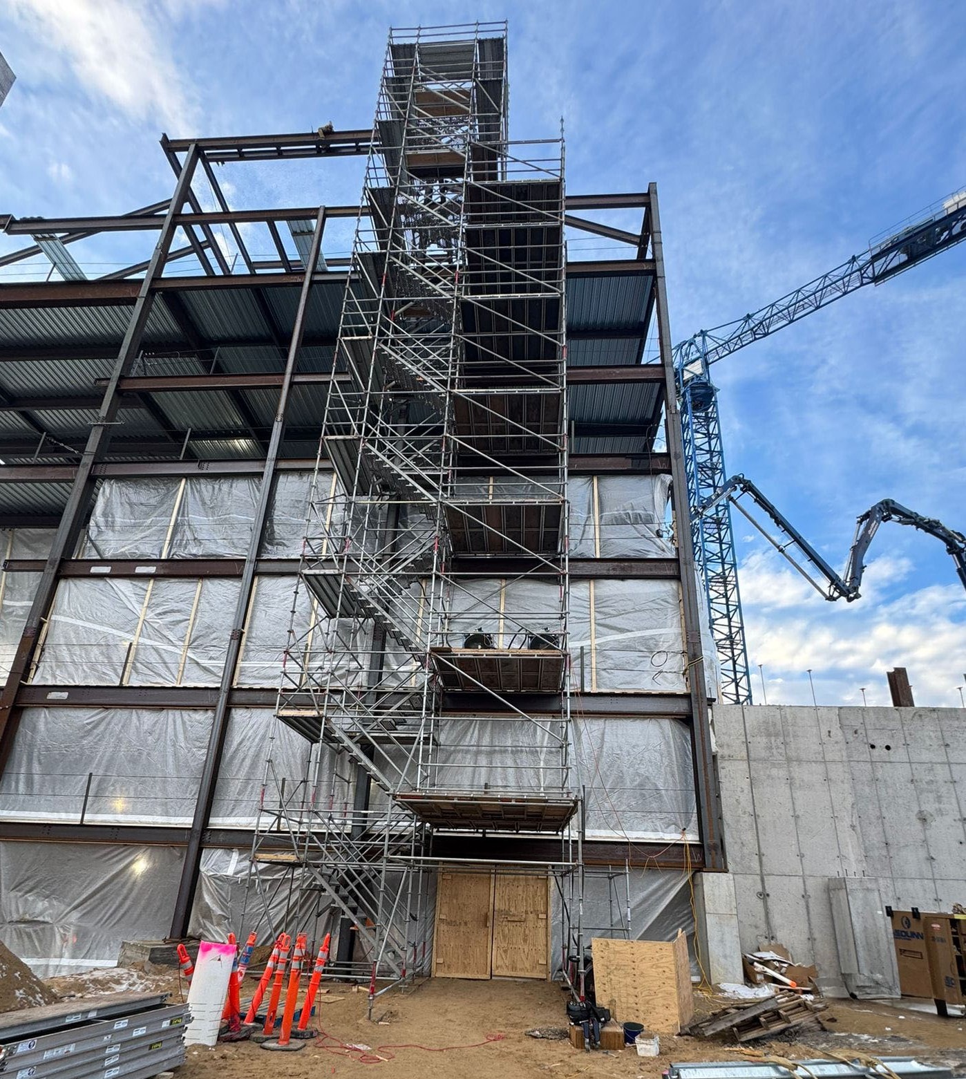 A tall system scaffolding stair tower on a jobsite in Minnesota