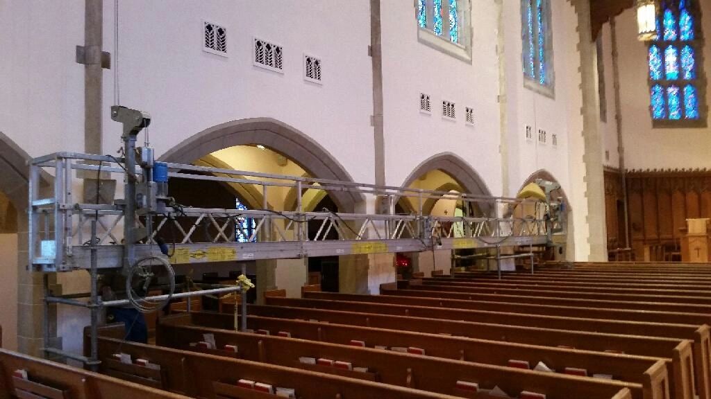 Swing stage used for interior work in a church