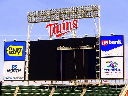 Swing stage used for signage work at a stadium